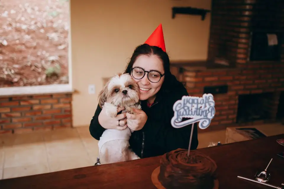 Dog being hugged by owner