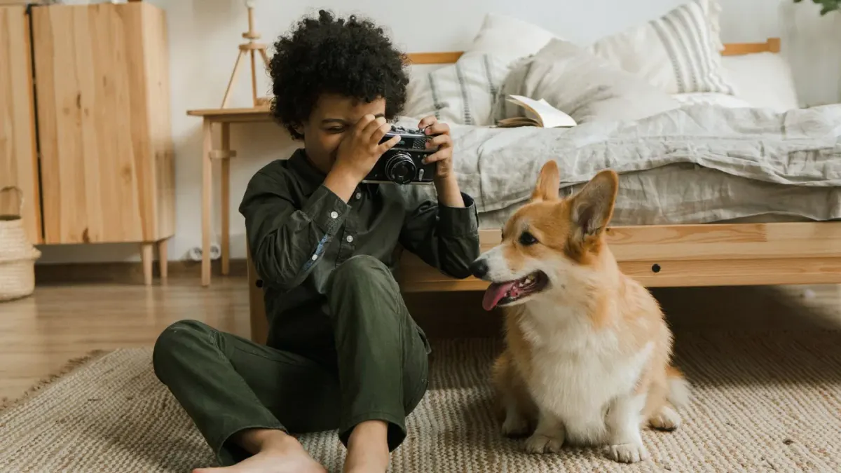 Owner and dog on floor together