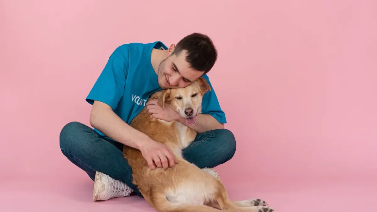 Owner and dog on floor together