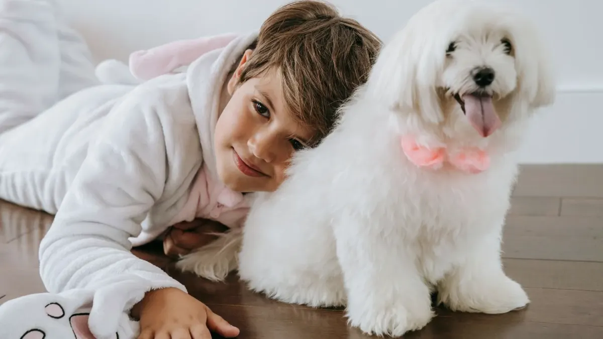 Owner and dog on floor together