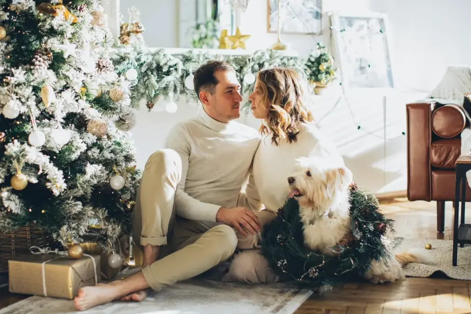 Owner and dog on floor together